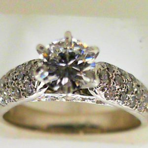 Diamond Engagement Ring 
Platinum Yellow/White Engagement Ring 1.03twt
Finger Size 6.5 Gram Weight 6.9gram weight Width: 4 
1 Center Diamond 0.52ct Shape: Round Clarity: VVS1 Colour: G With 42 Round Diamonds 0.51 ctw 1.03