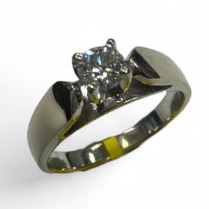 Estate Diamond Engagement Ring 
14 Karat White Estate Engagement Ring 
Finger Size 5.25 Gram Weight 2.9 
1 Center Diamond 0.20ct Shape: Round; Clarity: I1; Colour: G 0.2