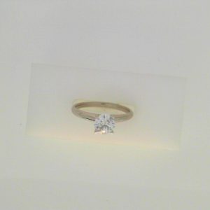 Estate Diamond Engagement Ring 
14 Karat White Estate Engagement Ring 
Finger Size 7 Gram Weight 2.4 
1 Center Diamond 0.66ct Shape: Round; Clarity: I2; Colour: F 0.66