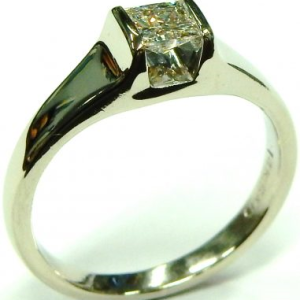 Estate Diamond Engagement Ring 
14 Karat White Estate Engagement Ring Width 2mm 
Finger Size 5.5 Gram Weight 3.4 
1 Center Canadian Diamond 0.30ct Shape: Princess; Clarity: VS1; Colour: H 0.3