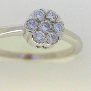 Estate Diamond Engagement Ring 
14 Karat White Estate Engagement Ring 
Finger Size 9.75 Gram Weight 3.2 
 Center Diamond Shape: Round; Clarity: VS; Colour: I 0.3