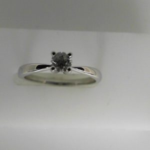 Estate Diamond Engagement Ring 
14 Karat White Estate Engagement Ring Width 2.34mm 
Finger Size 6.5 Gram Weight 2 
1 Center Diamond 0.22ct Shape: Round; Clarity: SI; Colour: G 0.22