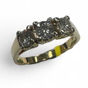 Estate Diamond Engagement Ring 
14 Karat Yellow Estate Engagement Ring 
Finger Size 6 Gram Weight 3 
3 Center Diamonds Shape: Round; Clarity: SI1; Colour: K 0.55