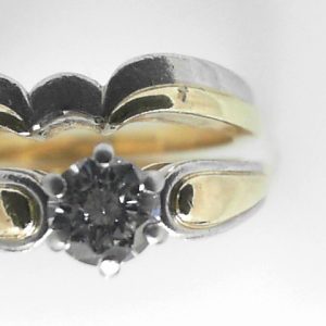 Estate Diamond Engagement Ring 
18K/Platinum Yellow/White Estate Engagement Ring 
Finger Size 6.5 Gram Weight 8.41 
1 Center Diamond 0.47ct Shape: Round; Clarity: VS1; Colour: F/G 0.47