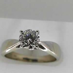 Estate Diamond Engagement Ring 
14 Karat White Estate Engagement Ring 
Finger Size 7 Gram Weight 4.2 
1 Center Diamond 0.70ct Shape: Round; Clarity: SI1; Colour: M 0.7