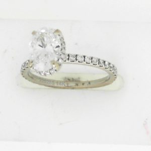 Estate Diamond Engagement Ring 
14 Karat White Estate Engagement Ring Width 1.6mm 
Finger Size 4.75 Gram Weight 1.9 
1 Center Created Diamond (Lab) 1.03ct Shape: Oval; Clarity: VVS2; Colour: E With 44 Round Diamonds 0.28 ctw 1.31