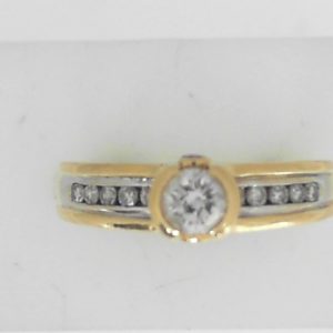 Estate Diamond Engagement Ring 
18 Karat Yellow Estate Engagement Ring 
Finger Size 8.5 Gram Weight 5.43 
1 Center Diamond 0.26ct Shape: Round; Clarity: I1; Colour: I/J 0.26