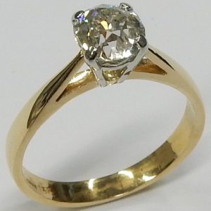 Estate Diamond Engagement Ring 
18 Karat Yellow Estate Engagement Ring 
 Gram Weight 2.8 
1 Center Diamond 1.00ct Shape: Old Mine Cut; Clarity: I1; Colour: J 1