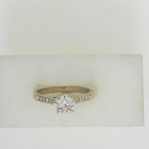 Estate Diamond Engagement Ring 
14 Karat White Estate Engagement Ring 
Finger Size 6.25 Gram Weight 2.6 
1 Center Diamond 0.53ct Shape: Round; Clarity: SI2; Colour: G With 12 Round Diamonds 0.20 ctw 0.73