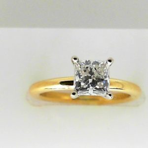 Estate Diamond Engagement Ring 
18 Karat Yellow Estate Engagement Ring Width 2.5mm 
Finger Size 5.25 Gram Weight 3.1 
1 Center Diamond 1.02ct Shape: Princess; Clarity: SI2; Colour: H 1.02