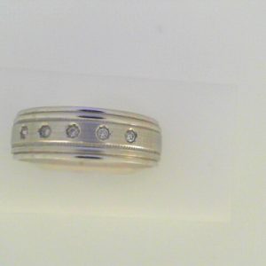 Diamond Ring- Men's 
10 Karat White Men's Diamond Ring 
Finger Size 10 Gram Weight 7.44 
 Center Diamond Shape: Round