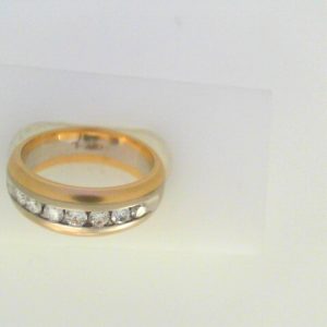 Diamond Ring- Men's 
14 Karat Yellow/White Men's Diamond Ring 
Finger Size 6.5 Gram Weight 6.85 
 Center Diamond Shape: Round 0.35