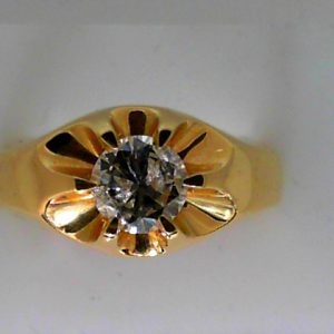 Estate Diamond Ring - Men's 
14 Karat Yellow Estate Diamond Ring Width 10.4mm 
Finger Size 9 Gram Weight 8.12 
1 Center Diamond 0.86ct Shape: Round; Clarity: I2; Colour: M 0.86