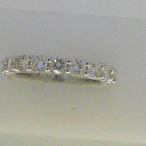 Diamond Wedding/Anniversary Ring 
18 Karat White Wedding/Anniversary Ring Width 0.11mm 
Finger Size 5 Gram Weight 3.4 
20 Center Diamonds Shape: Round; Clarity: SI1; Colour: I/J 1.72
