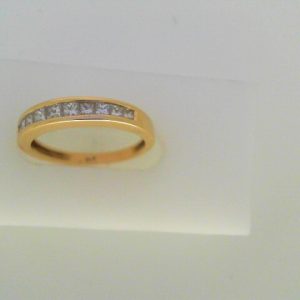 Diamond Wedding/Anniversary Ring 
14 Karat Yellow Wedding/Anniversary Ring 
Finger Size 6.5 
10 Center Diamonds Shape: Round 0.5