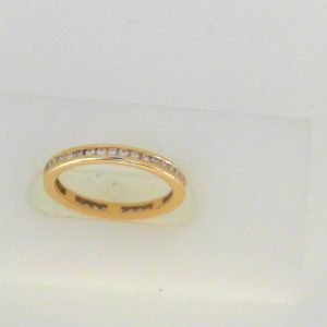 Diamond Wedding/Anniversary Ring 
14 Karat Yellow Wedding/Anniversary Ring 
Finger Size 4.5 
 Center Diamond Shape: Round 0.41