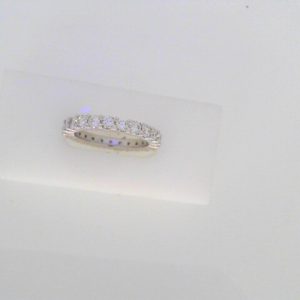 Diamond Wedding/Anniversary Ring 
18 Karat White Wedding/Anniversary Ring 
Finger Size 6.5 Gram Weight 4.4 
23 Center Diamonds Shape: Round; Clarity: VS; Colour: H 1.98