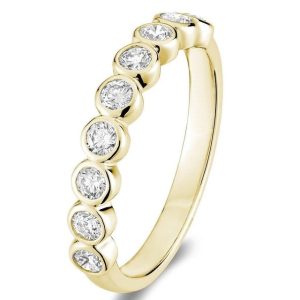 Diamond Wedding/Anniversary Ring 
14 Karat Yellow Wedding/Anniversary Ring 
Finger Size 6.5 Gram Weight 2 
9 Center Diamonds Shape: Round 0.52