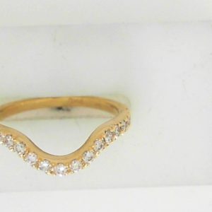 Diamond Wedding/Anniversary Ring 
18 Karat Yellow Wedding/Anniversary Ring 
Finger Size 7 Gram Weight 3.1 
19 Center Created Diamond (Lab)s Shape: Round; Clarity: VS; Colour: F/G 0.35