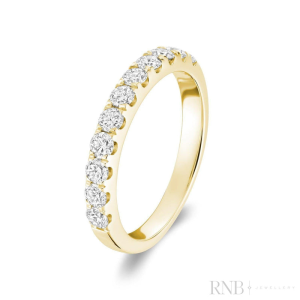 Diamond Wedding/Anniversary Ring 
14 Karat Yellow Wedding/Anniversary Ring 
Finger Size 6.5 Gram Weight 3.1 
11 Center Diamonds Shape: Round 0.68