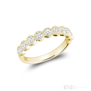 Diamond Wedding/Anniversary Ring 
14 Karat Yellow Wedding/Anniversary Ring 
Finger Size 6.5 Gram Weight 2.23 
11 Center Diamonds Shape: Round 0.48