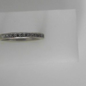 Estate Diamond Anniversary Ring 
14 Karat White Estate Anniversary Ring 
Finger Size 6.5 Gram Weight 2.3 
15 Center Diamonds Shape: Round; Clarity: SI1; Colour: I 0.25