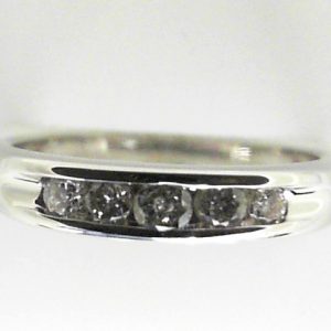 Estate Diamond Anniversary Ring 
14 Karat White Estate Anniversary Ring 
Finger Size 7 Gram Weight 2.7 
5 Center Diamonds Shape: Round; Clarity: I1; Colour: J 0.3