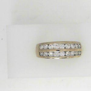 Estate Diamond Anniversary Ring 
14 Karat White Estate Anniversary Ring 
Finger Size 6.5 Gram Weight 4.6 
18 Center Diamonds Shape: Round; Clarity: SI1; Colour: I 1