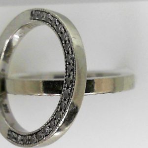 Estate Diamond Anniversary Ring 
14 Karat White Estate Anniversary Ring 
Finger Size 5.75 Gram Weight 7.5 
40 Center Diamonds Shape: Round; Clarity: SI; Colour: H 0.4