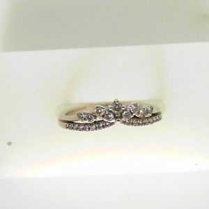 Estate Diamond Anniversary Ring 
10 Karat White Estate Anniversary Ring 
Finger Size 6.5 Gram Weight 2.2