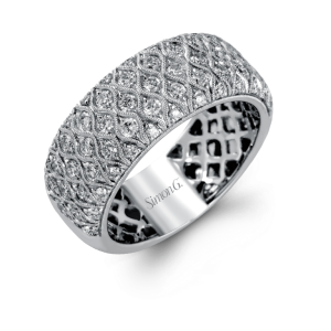 Diamond Dinner Ring - Women's 
18 Karat White Dinner Ring 
Finger Size 7 
 Center Diamond Shape: Round Clarity: VS1 Colour: F/G 0.95