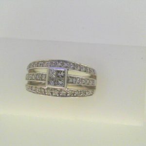 Diamond Dinner Ring - Women's 
14 Karat White Dinner Ring Width 3.6mm 
Finger Size 7 Gram Weight 5.2 
 Center Diamond Shape: Round 0.5