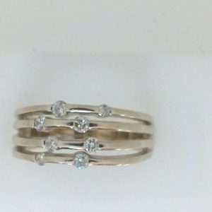 Lady's White Polished 14 Karat Band Dinner Ring Size 7 With 8=0.25Tw Round Diamonds MM Width: 3.3
Discount: 30
Gram Weight: 4.75
Stock Num: E6016
