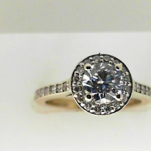 Estate Diamond Dinner Ring - Women's 
14 Karat White Estate Dinner Ring Width 2mm 
Finger Size 6.25 Gram Weight 3.7 
1 Center Diamond; 0.75ct Shape: Round; Clarity: SI1; Colour: E With 35 Round Diamonds 0.36 ctw 1.11
Jewellery Solution Cert JS00262215