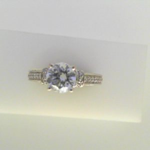 Diamond Semi-Mount Ring 
14 Karat White Ring 
Finger Size 6.25 
1 Center Cubic Zirconium 1.00ct Shape: Round Round Diamond 0.38 ctw 1.38