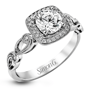 Diamond Semi-Mount Ring 
18 Karat White Ring 
Finger Size 6 
 Center Diamond Shape: Round; Clarity: VS1; Colour: F/G 0.16