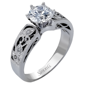 Diamond Semi-Mount Ring 
18 Karat White Ring 
Finger Size 6 
 Center Diamond Shape: Round; Clarity: VS1; Colour: F/G 0.07