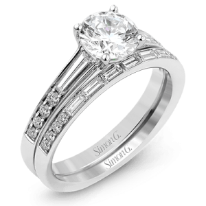 Diamond Semi-Mount Ring 
18 Karat White Ring 
Finger Size 7 
 Center Diamond Shape: Various Shapes; Clarity: VS1; Colour: F/G 0.34