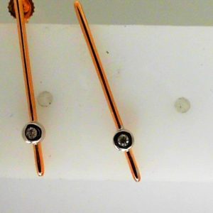Diamond Earrings 
10 Karat Rosé Diamond Earrings 
Gram Weight 1.34