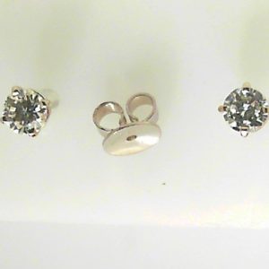 Diamond Earrings 
14 Karat White Diamond Earrings 
 
2 Center Diamonds Shape: Round Clarity: VS Colour: I 0.58