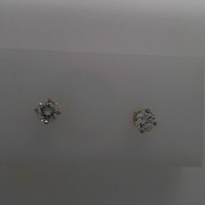 Estate Diamond Earrings 
14 Karat White Estate Diamond Earrings 
 
2 Center Diamonds Shape: Round; Clarity: SI2; Colour: G 0.74