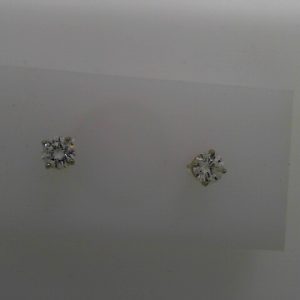 Estate Diamond Earrings 
14 Karat White Estate Diamond Earrings 
 
2 Center Diamonds Shape: Round; Clarity: SI1; Colour: H/I 0.77