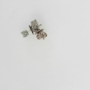 Estate Diamond Earrings 
14 Karat White Estate Diamond Earrings 
 
2 Center Diamonds Shape: Round; Clarity: VS; Colour: F/G 0.41