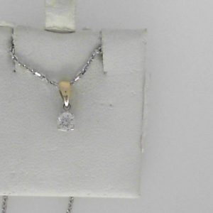 Diamond Pendant/Necklace 
14 Karat Yellow/White Diamond Pendant 
 Chain Style: Fancy Link 14 Karat White Length: 17in 
1 Center Diamond 0.20ct Shape: Round; Clarity: SI1; Colour: G 0.2