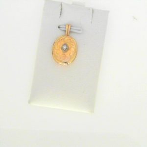 Diamond Pendant/Necklace 
10 Karat Yellow Diamond Pendant 
Gram Weight 1.87 Chain Style: No Chain 
1 Center Diamond 0.02ct Shape: Round 0.02