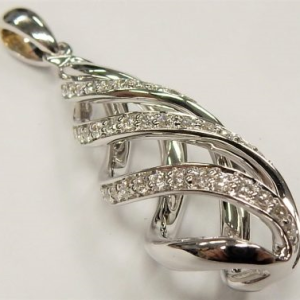 Estate Diamond Pendant/Necklace 
14 Karat White Estate Diamond Pendant 
Gram Weight 3.57 
45 Center Diamonds Shape: Round 0.2