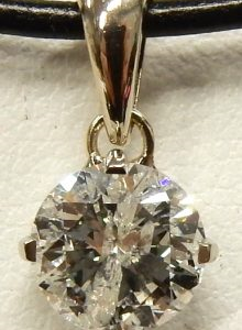 Estate Diamond Pendant/Necklace 
14 Karat White Estate Diamond Pendant 
 Chain Style: No Chain 
1 Center Diamond 1.12ct Shape: Round; Clarity: I2; Colour: G 1.12