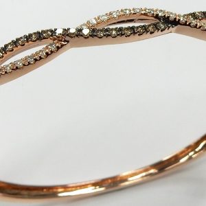 Estate Diamond Bracelet 
14 Karat Rosé Estate Diamond Bracelet Width: 5.8mm 
Gram Weight 11.5 
79 Center Diamonds Shape: Round 1