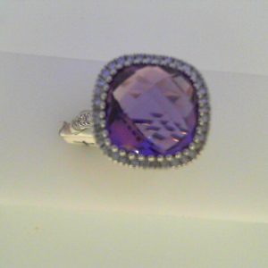 Amethyst Ring 
14 Karat White Amethyst Ring With Finger Size 6.75 
Width 1.55mm Gram Weight 4.27 
1 Center Amethyst 4.98ct Shape: Cushion With 36 Round Diamonds 0.33 ctw