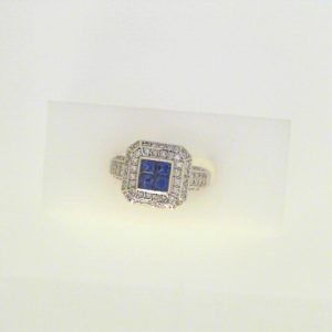 Sapphires Ring 
14 Karat White Sapphires Ring With Finger Size 6.5 
Width 3.3mm Gram Weight 6.8 
4 Center Sapphires Shape: Princess Round Diamond 0.36 ctw